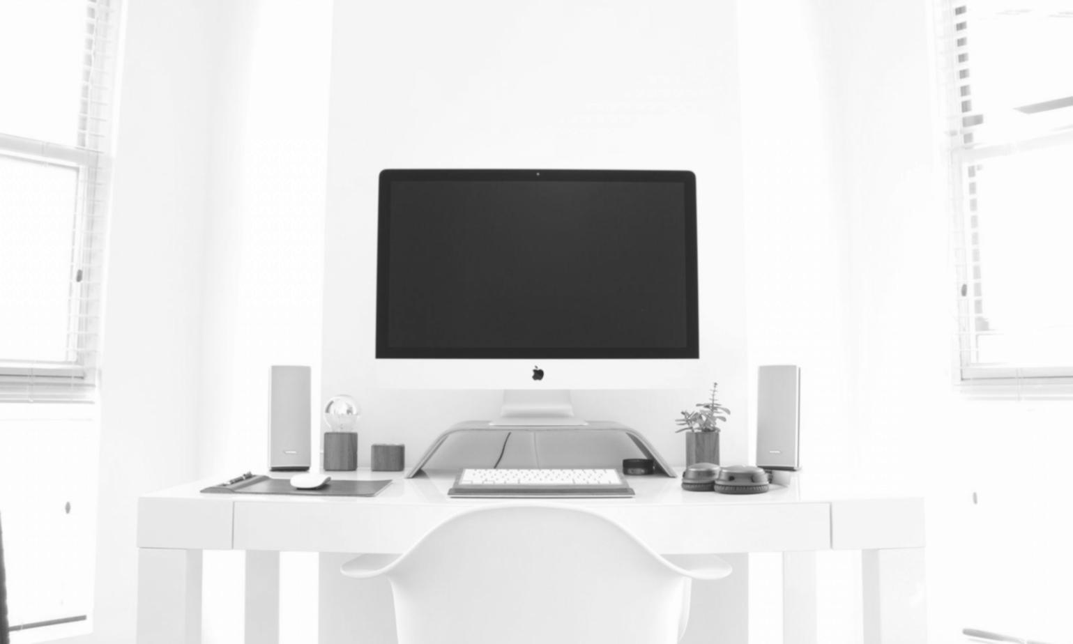 Professional financial planning workspace with charts and documents
